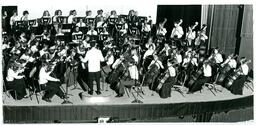 Orchestra Performing on Stage (Part of the NMU Historic Photographs Collection)