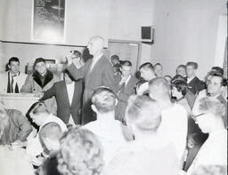 (605-02) Pep Rally After Hillsdale Game Sept. 18, 1960: Different View of Crowd with Tall Bald Man