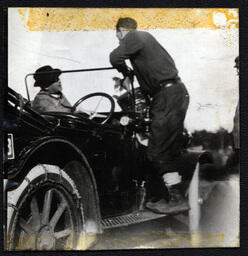 Two Men Talking in Car