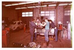 Four Students Removing Engine from Car (Part of the NMU Historic Photographs Collection)