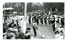 Marching Band and Color Guard Performing in London while Crowd Watches (Part of the NMU Historic Photographs Collection)