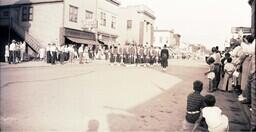 (005-013) Shriners Walking Past F.J. Lyons Drug Company (2 of 2)