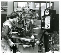 Student Milling Metal with Machine (Part of the NMU Historic Photographs Collection)