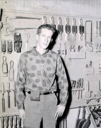 Industrial Arts Instructor Paul Mattson, ___student and bait box May 1961: Paul Mattson Smiling With Teeth