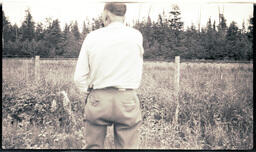 Back of Man in Field