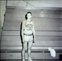 NMC Basketball--Individual Pictures 1960-61: Basketball Player No. 30 Posing for Photo