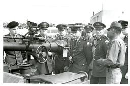 Group of Men in Military Uniforms Standing around Cannon (Part of the NMU Historic Photographs Collection)