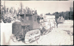 Tractor Hauling Logs, 1 of 2