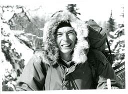 Man in Winter Coat Hiking in Woods (Part of the NMU Historic Photographs Collection)