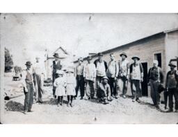 Group of Men and Two Young Girls