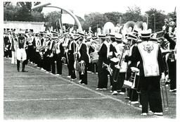 Marching Band Standing on Sidelines of Football Field (Part of the NMU Historic Photographs Collection)