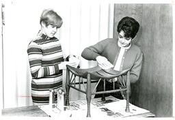 Two Students Staining Chair (Part of the NMU Historic Photographs Collection)