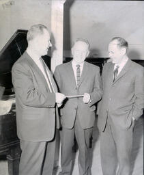 Music Department--Ray Uhlinger; Dr. Allen Niemi; Dr. Harold Wright March 1961: Three Men in Suits Standing Together