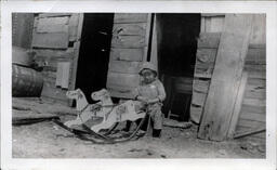 Young Tom Ross Playing Sheriff