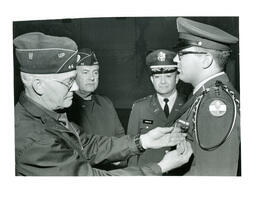 Four Military Men at Pinning Ceremony (Part of the NMU Historic Photographs Collection)