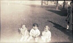 (039-003) Three children at a park