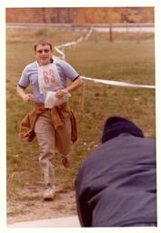 Competitor Running Towards Table (Part of the NMU Historic Photographs Collection)