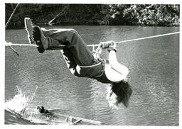 Student Hanging Upside Down from Tightrope (Part of the NMU Historic Photographs Collection)