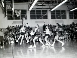 Basketball--NMC vs. Michigan Tech at Michigan Tech Feb. 22, 1961: Men Playing Basketball