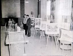 (150-02) Student Art Exhibit--Spring 1960: Two Men Look at Paintings