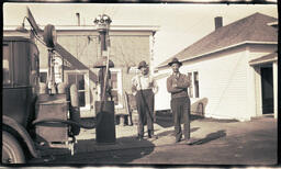 Men at Gas Station