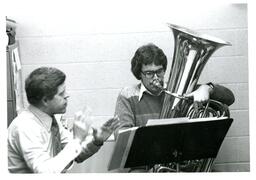 Professor Working with Tuba Student (Part of the NMU Historic Photographs Collection)