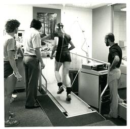 Group of People Running Treadmill Experiment (Part of the NMU Historic Photographs Collection)