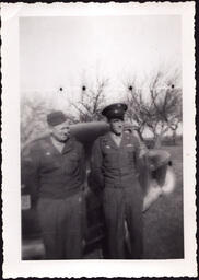 Two Soldiers next to Car