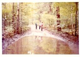 Competitors Standing Behind Puddle in the Woods (Part of the NMU Historic Photographs Collection)