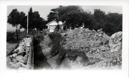 Stones and Dirt near House