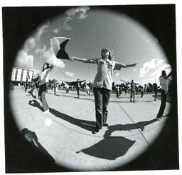 Fisheye Camera View of Flag Twirlers Practicing near Thomas Fine Arts (Part of the NMU Historic Photographs Collection)