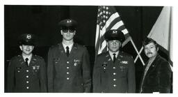 Maust, Czap, Bogan, and Another Man Posing in Uniform (Part of the NMU Historic Photographs Collection)