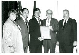 Michigan Governor James Blanchard and Group Posing with Resolution (Part of the NMU Historic Photographs Collection)