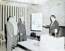 Jon (?) Railroad Trainer--Jack Myers Dec. 1960: Man Presenting Charts