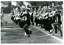 Marching Band Marching in Lines on Field (Part of the NMU Historic Photographs Collection)