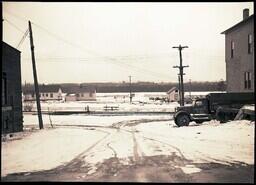 (019-005) People's Supply Company Truck Parked in Snow