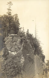 Rock cliff on lake shore