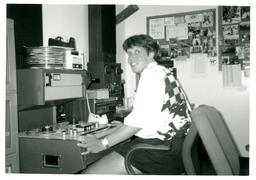 Student Operating Reel-to-Reel Audio Machine (Part of the NMU Historic Photographs Collection)