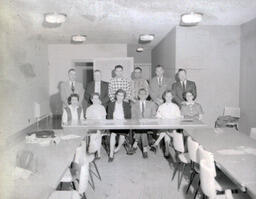 (676-01) Credit Union 1961: Photo of Six People Sitting and Six Standing