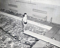 NMC Swimming Team 1961: Man Standing on Diving Board