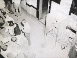 Interior Dorm and Kaye Hall Pictures 1955: Blurry Photo of Students Around Table