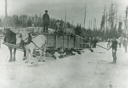 Sprinkler sled at the Jauquet brothers' logging camp