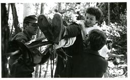 Two Men Supporting Person on Zipline (Part of the NMU Historic Photographs Collection)