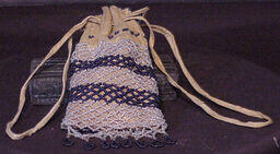 Leather pouch with beaded netting