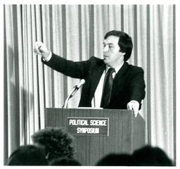 Man Speaking at Political Science Symposium (Part of the NMU Historic Photographs Collection)