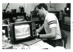 Man Working on TV (Part of the NMU Historic Photographs Collection)