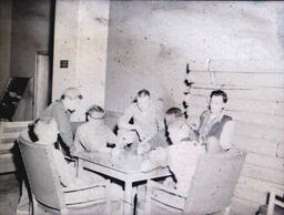 Interior Dorm and Kaye Hall Pictures 1955: Seven Men Sitting Around Table Inside