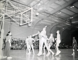 NMC Alumni Basketball 1960-61: Men Playing Basketball Different View