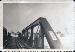 Young Tom Ross on Railroad Bridge