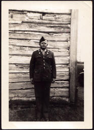 Soldier next to House